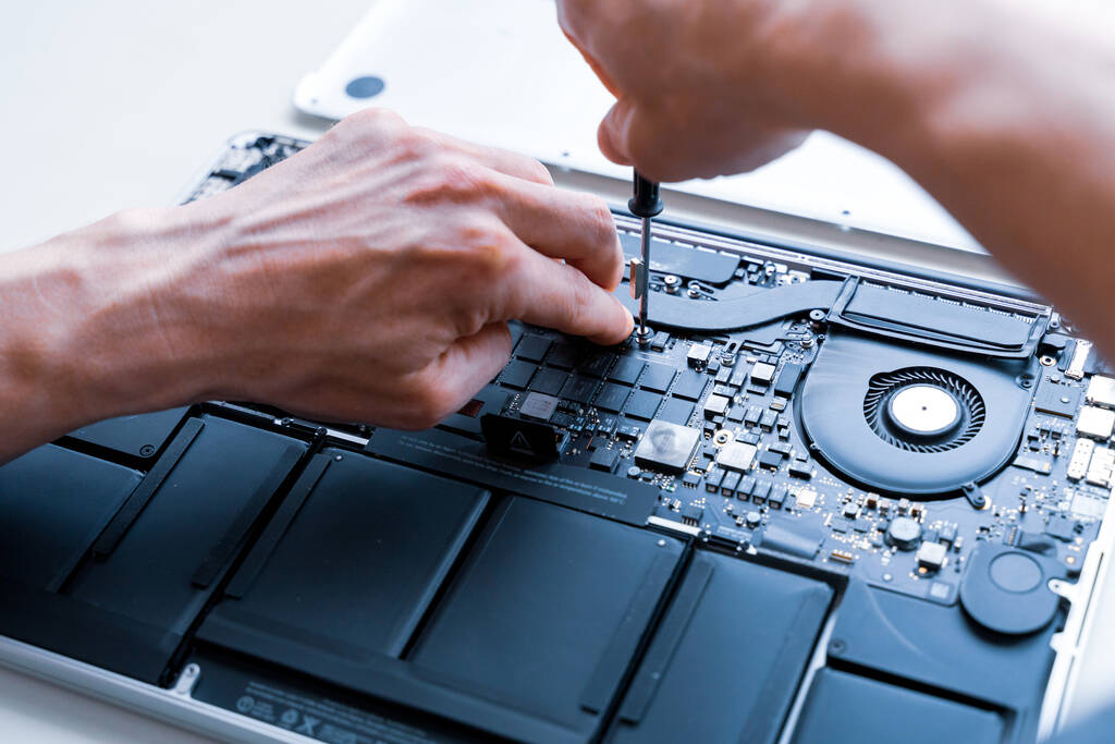 Computer motherboard. Pc technician repair service with laptop on hardware technology background. Maintenance engineer support. Developer soldering electronic component